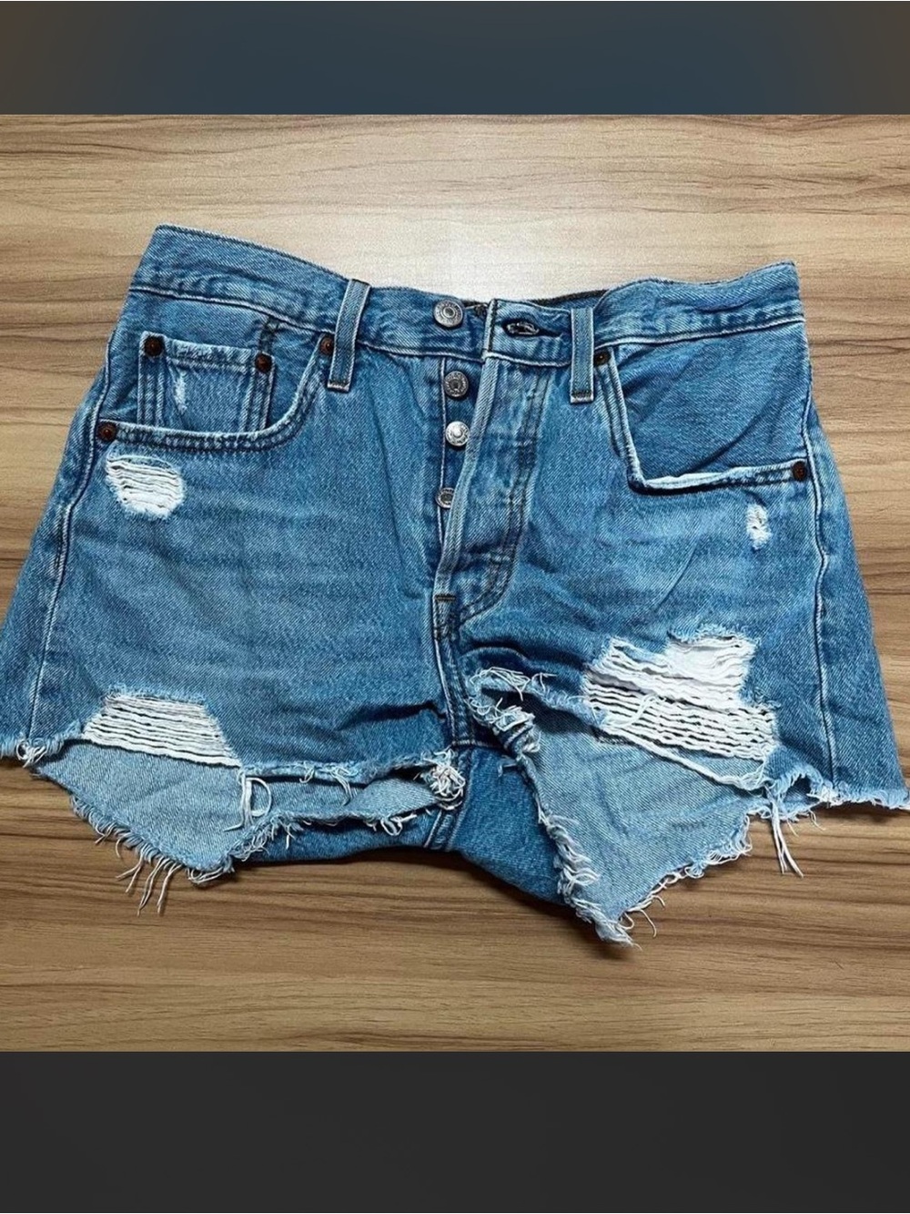 Levi’s Distressed Button Fly Denim Cutoff Shorts